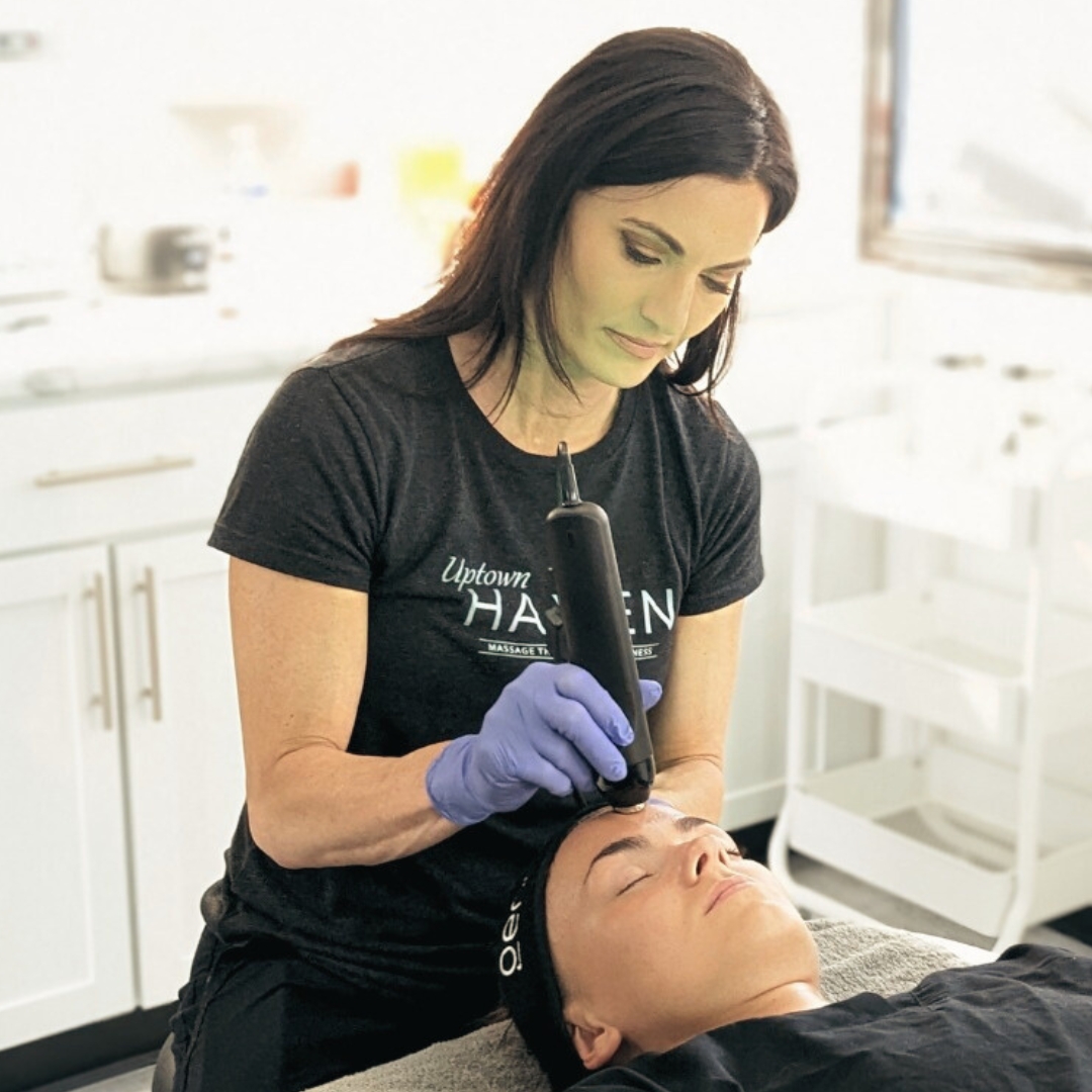Clean, professional medical spa treatment room with neutral tones at Uptown Haven in Fargo