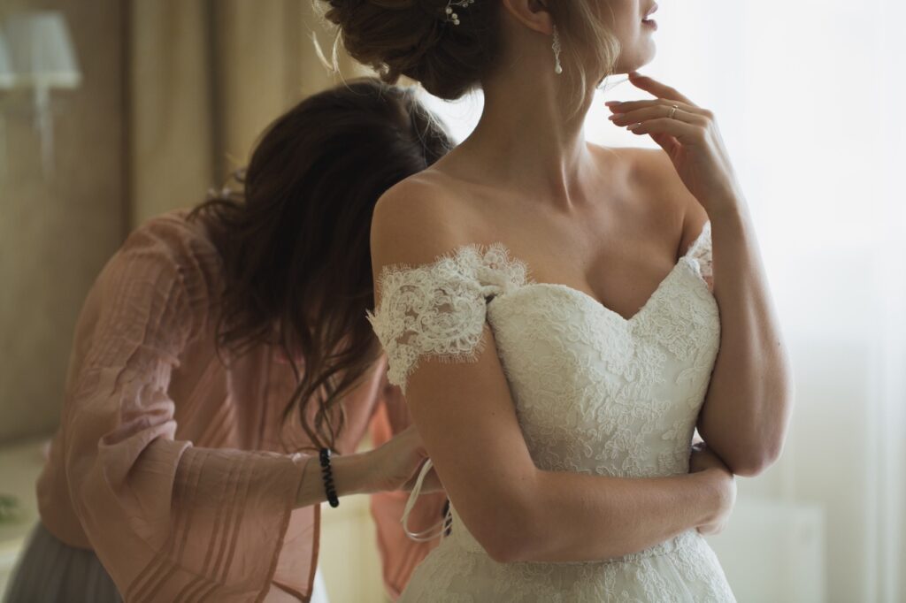 Bride in dress prepped for wedding with body sculpting in Fargo-Moorhead