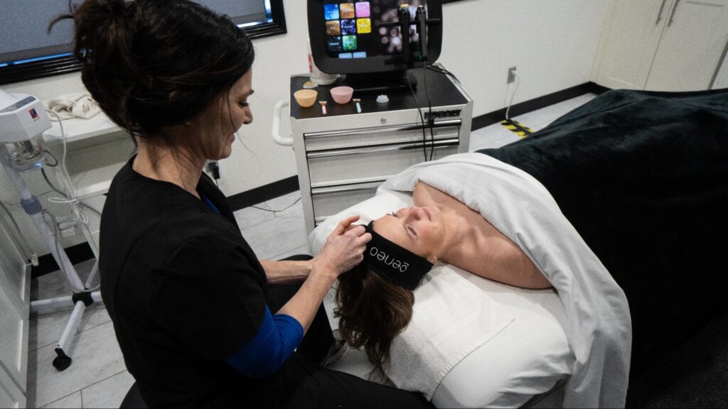 A professional aesthetician and her client during an acne facial session in Fargo ND