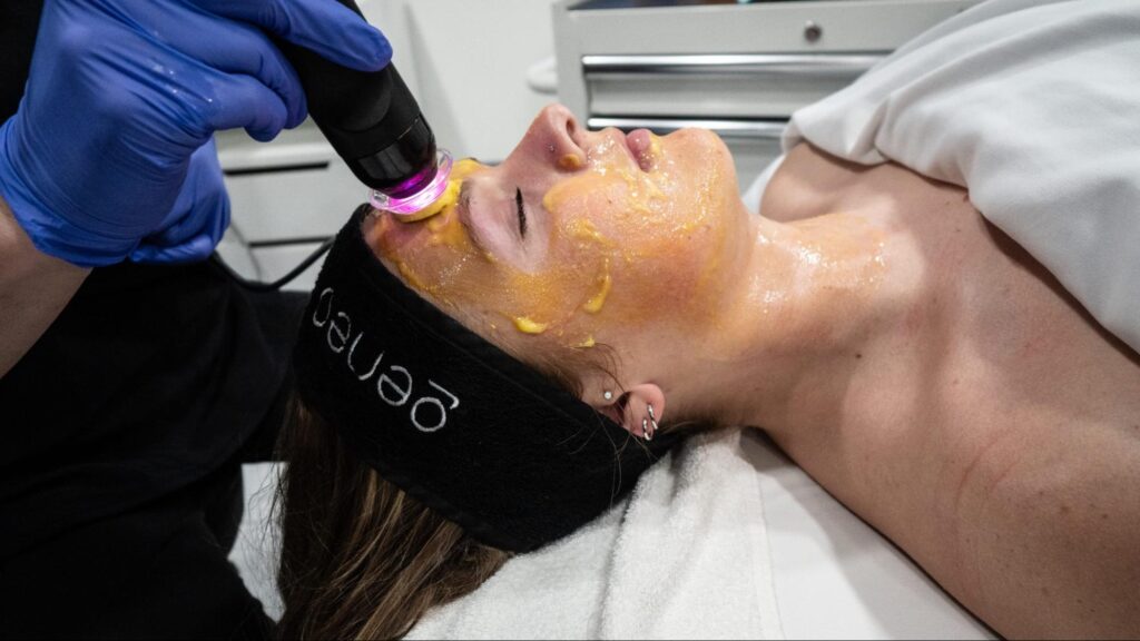 A woman relaxing with a glo2facial near downtown Fargo