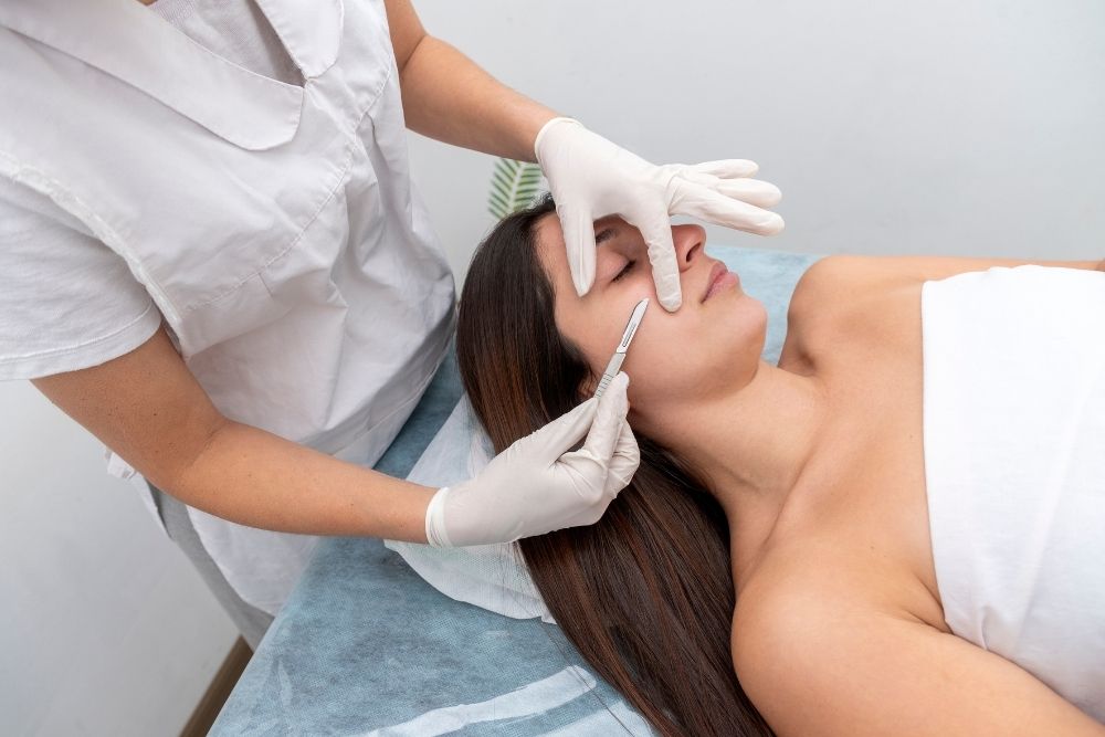Close-up of a professional dermaplaning procedure.